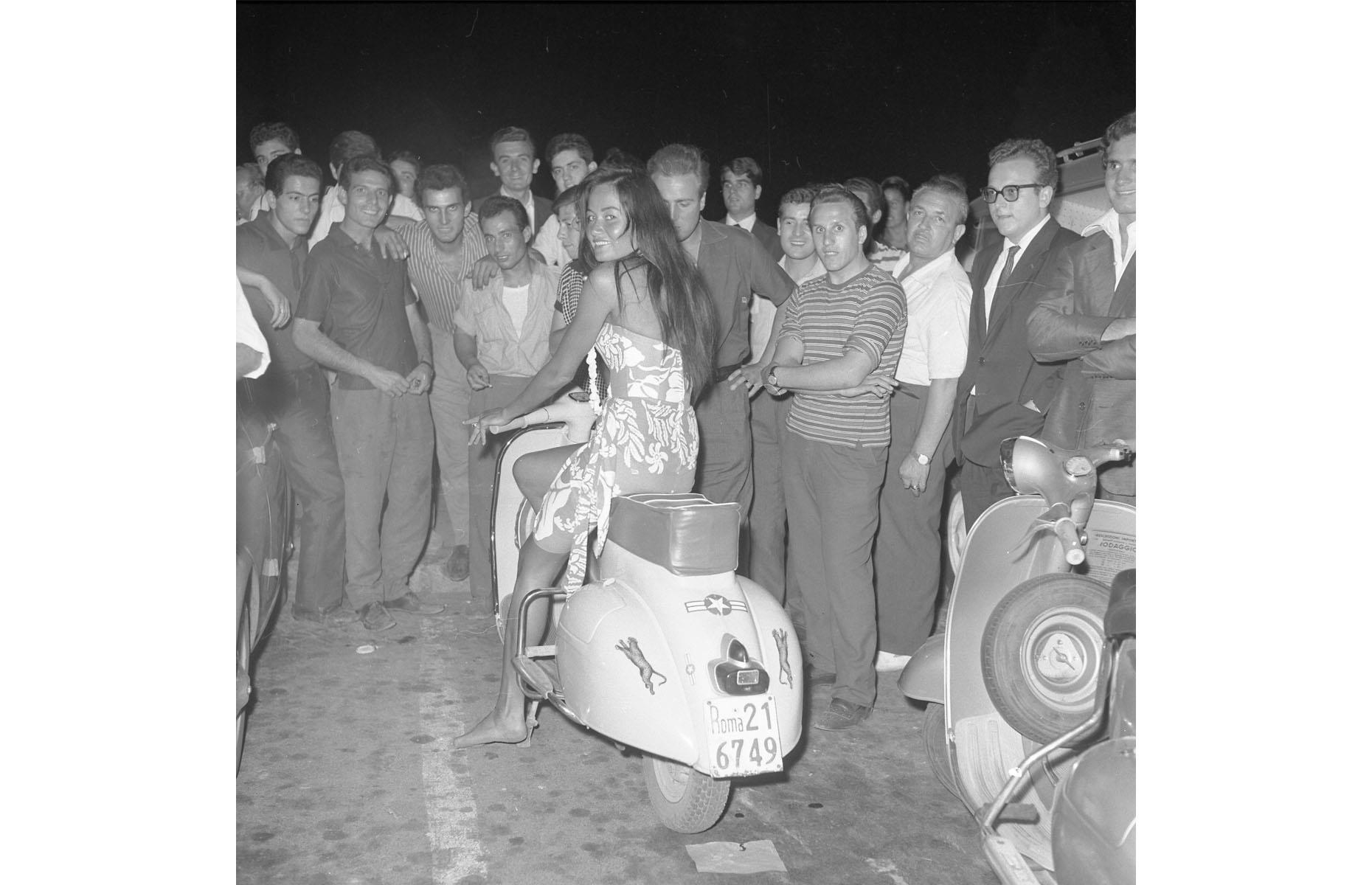 Italian teenagers and a Vespa, 1950s